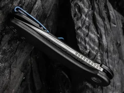 Elementum Damascus Titanium Black|WE Knife Outlet